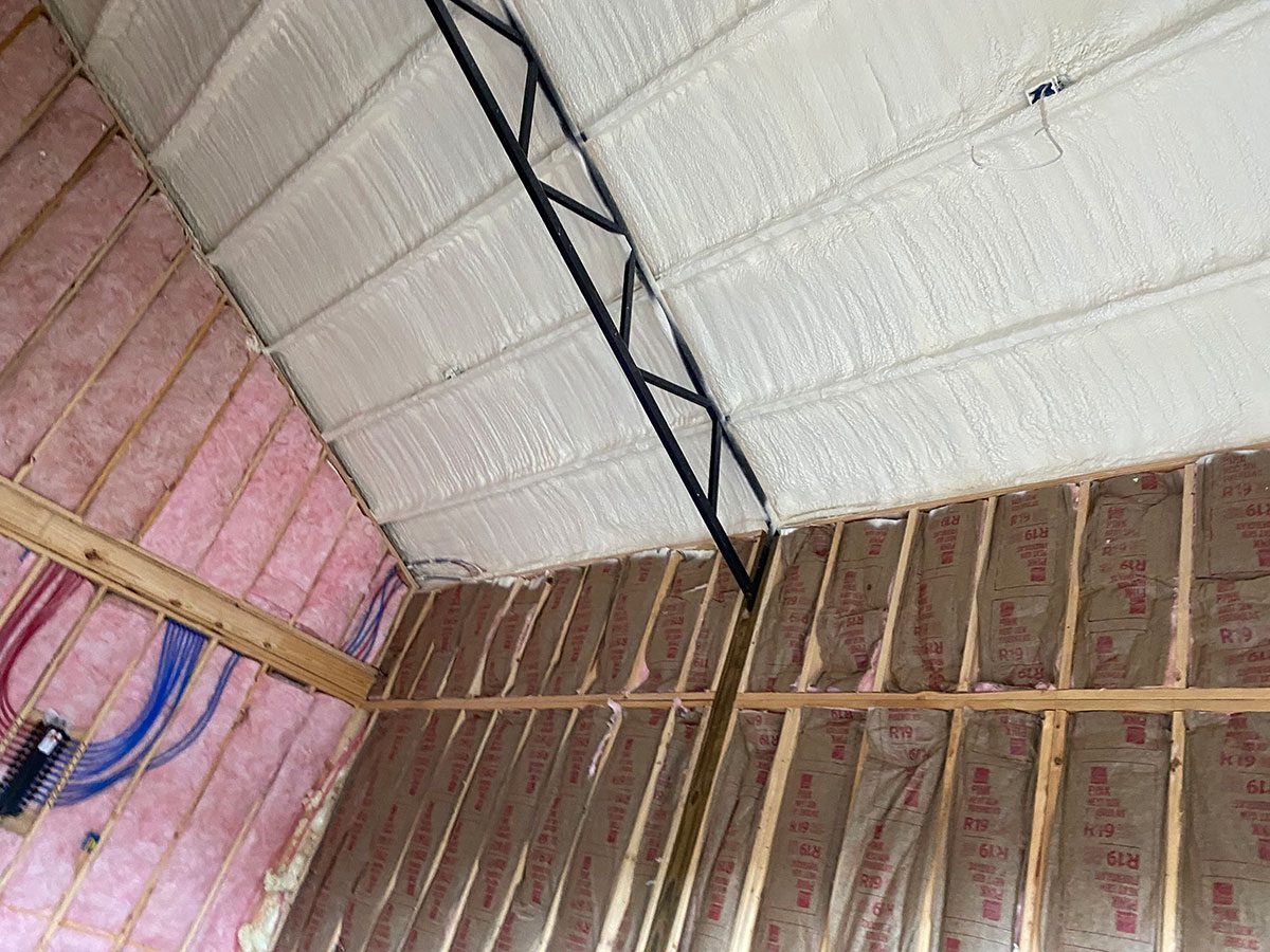Closed-cell spray foam ceiling with R-19 fiberglass batt walls