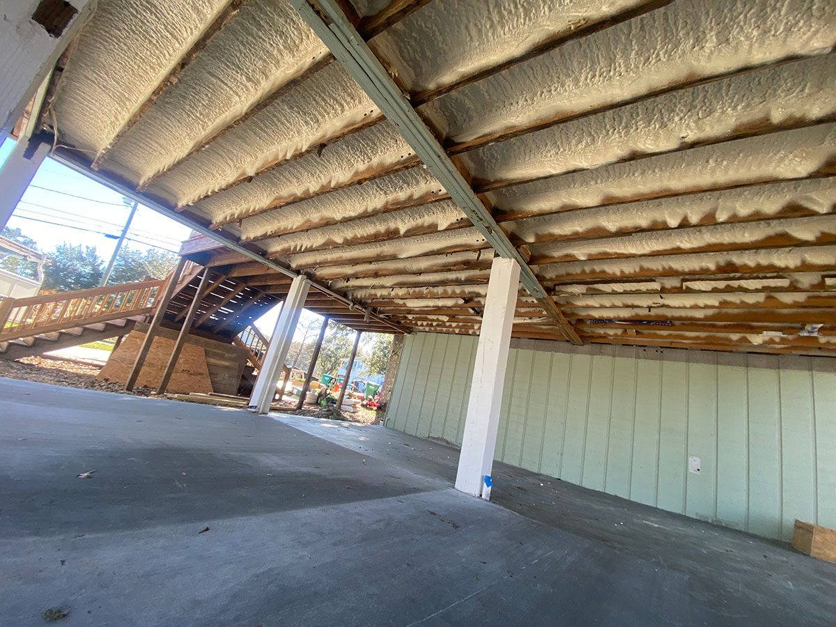 Open-cell spray foam ceiling installation in new construction